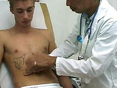 College boy gets examed by doctor.